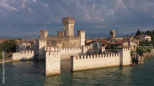 Wallpaper Mural Aerial View of Scaligero Castle of Sirmione, Lake Garda, Italy – Medieval UNESCO Heritage in Sunny Day Slow Flight Drone Video Torontodigital.ca