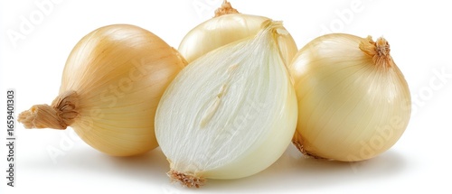 Fresh yellow onions, whole and sliced, on white background