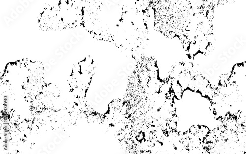 Abstract black grunge texture on a white background, with scattered speckles, rough cracks, and distressed patterns. Weathered stone, worn concrete, or aged ink splatters, and textured aesthetic