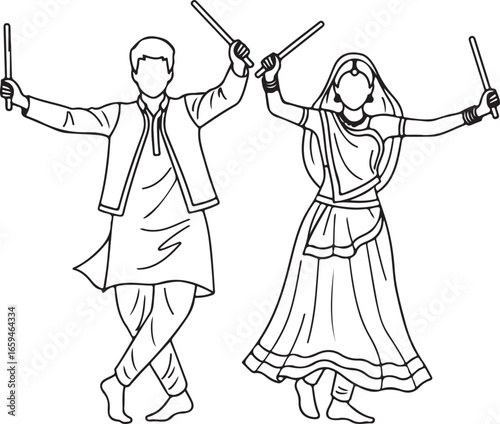 Man and woman performing Garba dance with sticks Dandiya Raas