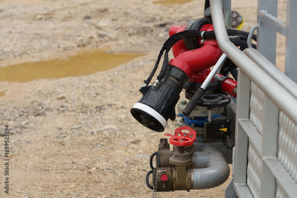 Obraz premium Fire extinguishing equipment, nozzles and hoses are ready in case of fire.
