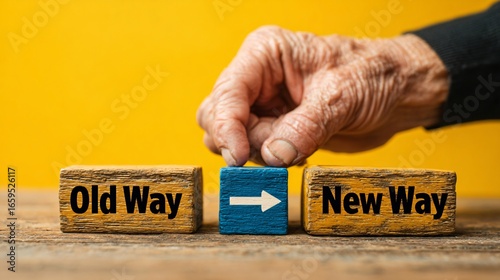 Old way to new way concept with hand placing arrow block