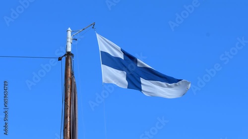 Flag of Finland on a sailing ship 