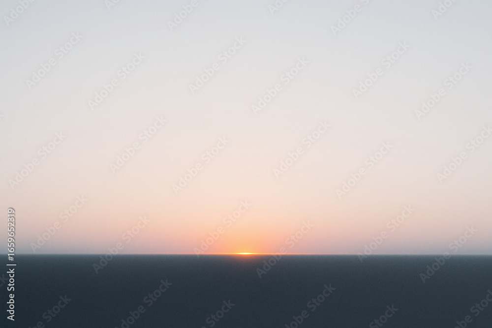 Obraz premium Blurred Sunset Over Horizon