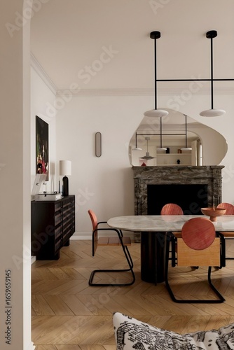 Fabulous and modern kitchen with a stylish kitchen table in a luxurious design style..