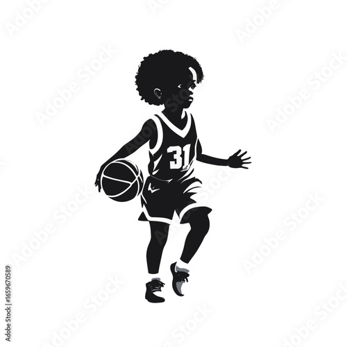Young basketball player dribbling a ball on the court during daytime practice session