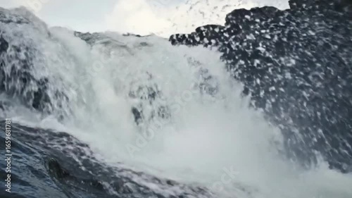 Powerful waterfall cascading over rocks