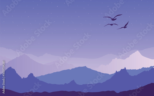 A landscape with layers of purple and blue mountain ranges disappearing into the distance. Three dark birds are flying in the upper part of the sky.