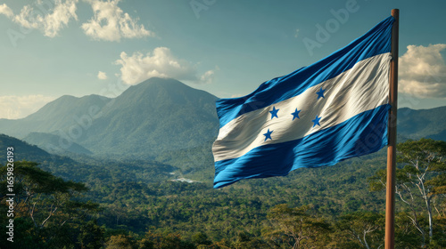Honduras flag waving proudly in the breeze during Independence Day celebration in a mountainous landscape