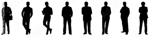 silhouettes of business people.  group of standing and walking business people