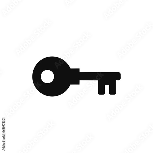 A black key with a hole in the middle