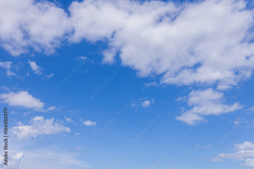 Fototapeta premium Clouds and daytime sky,Blue sky with scattered white cumulus clouds.