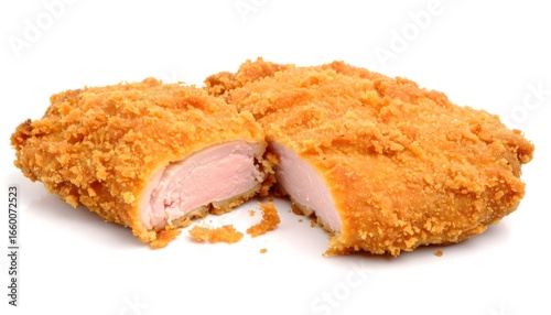Crispy fried chicken breast cutlet recipe isolated on white background