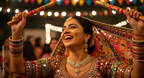 Joyful Indian Woman Dancing Garba with Dandiya Sticks at a Vibrant Festival Night