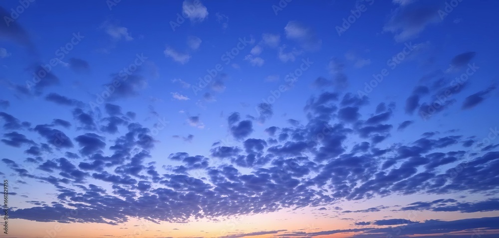 Obraz premium Vast, serene, twilight blue sky, scattered clouds, clear, bright