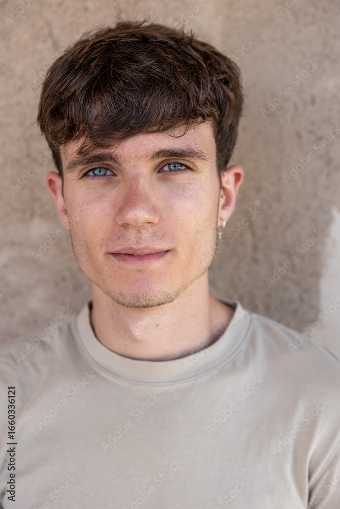 Obraz premium Portrait of attractive young man with blue eyes.