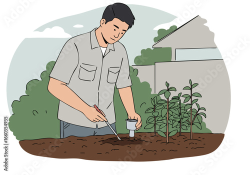 A young Asian man tests soil in his garden. He?s wearing casual clothes and appears focused on his task. The scene is outdoors with greenery in the background.