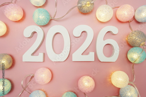 Happy New Year 2026 festive background with space on pink background