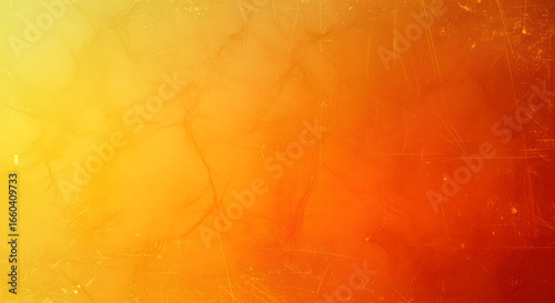 Abstract warm orange and yellow gradient background with distressed texture