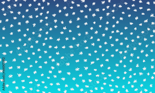 Snowy winter background made of doodle snowflakes on blue gradient