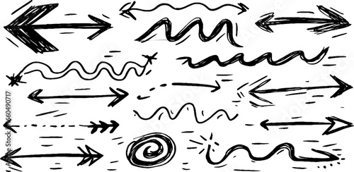 Hand drawn doodle set of straight and curved arrows for design projects