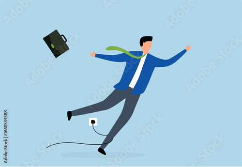 Failure or mistake, clumsy businessman tripping over power cord electrical plug that fell to the floor.