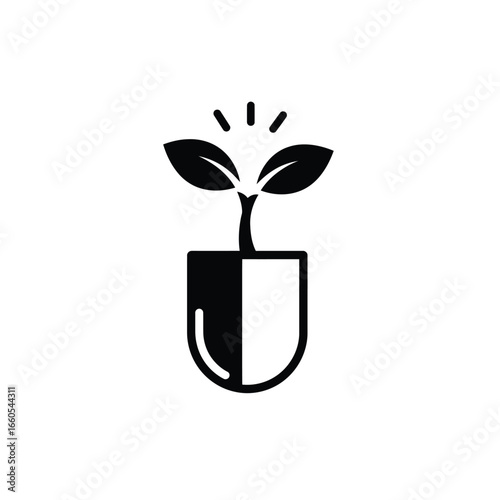 Black plant sprout in capsule medical health