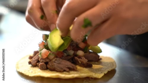 Hands Preparing Delicious Authentic Carnitas Taco With Fresh Ingredients