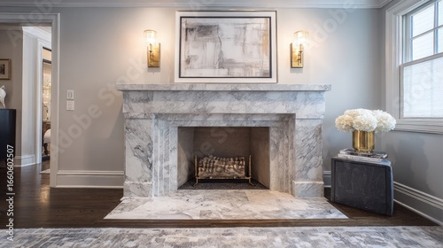 Elegant White Marble Fireplace In A Luxurious Living Room Interior With Gray Walls And Warm Lighting. Modern Home Design Decor Features A Classic