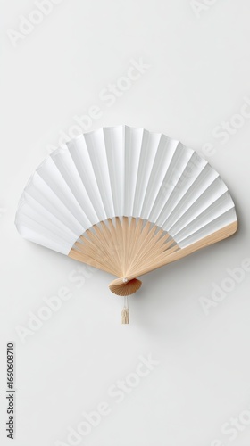 Stunning photo of mock-up of a white folding hand fan. White background.