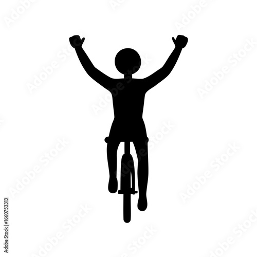 Silhouette of a triumphant cyclist with arms raised riding towards the viewer