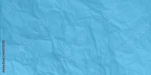 Seamless blue crumpled kraft paper texture. Empty textured sheet