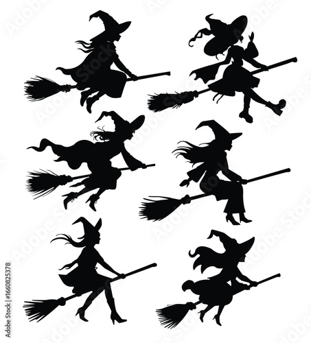 Silhouettes of halloween witches and broomsticks