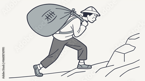 Man carrying a large bag uphill.