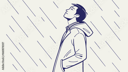 Man standing in the rain looking up.