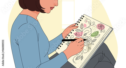 Woman sketching floral patterns in a spiral-bound notebook, focused and engaged in artistic activity.