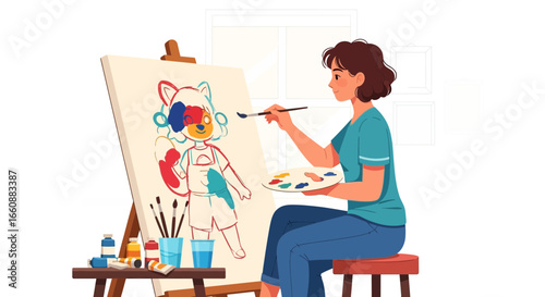 A woman sits on a stool painting a colorful cartoon character on a canvas with a brush and palette.