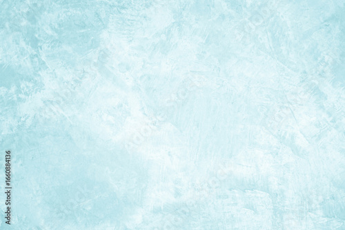 Pastel blue and white concrete stone texture for background in summer wallpaper. Cement and sand wall of tone vintage. Concrete abstract wall of light cyan color, cement texture mint green for design.