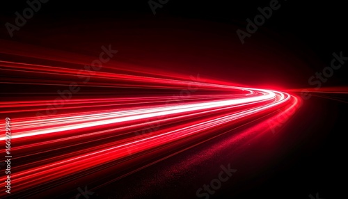 Dramatic red light trails creating sense of speed and dynamic energy on black backdrop