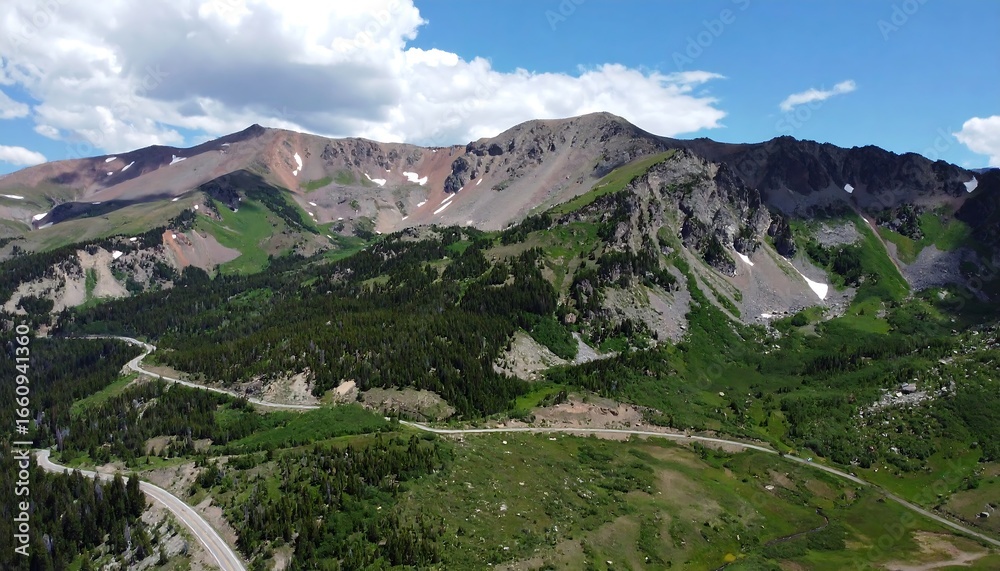 Fototapeta premium Mountainous landscape with winding road