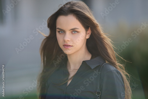 Tableau sur toile Portrait of a stylish teen girl outdoors