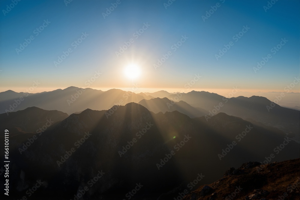 Naklejka premium sunrise in the mountains