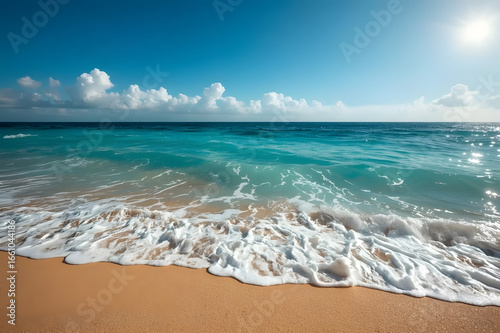 A coastline where turquoise ocean waves gently meet golden sandy beaches, to emphasize travel, relaxation, and the serene beauty of nature