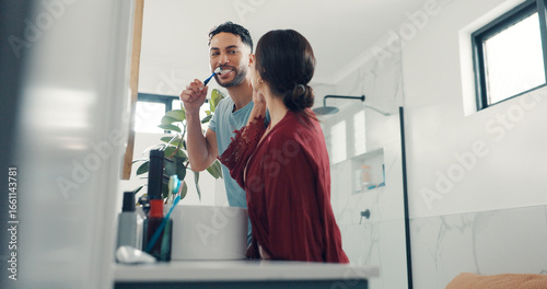 Tableau sur toile Brushing teeth, love and morning with couple in bathroom of home together for dental hygiene