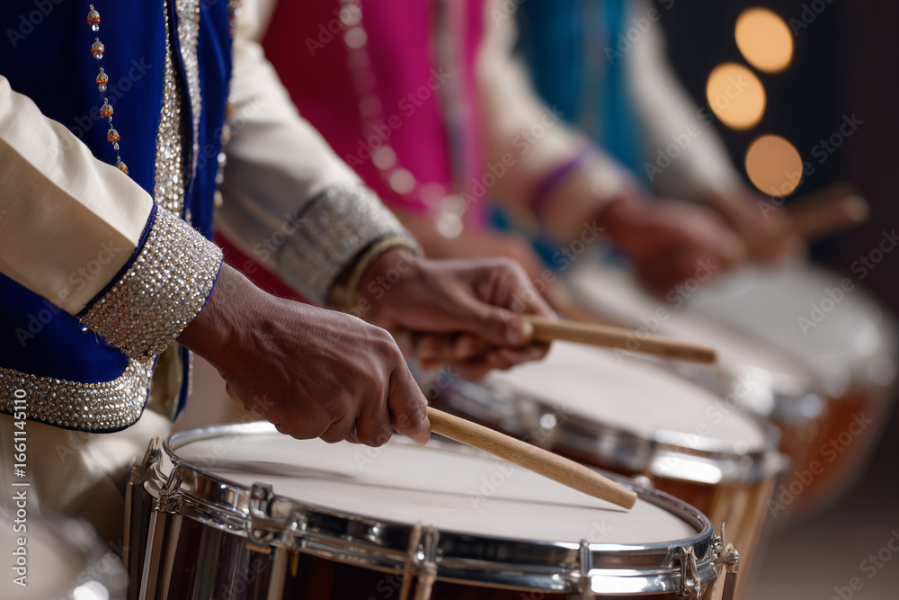 Obraz premium Baraat band with colorful instruments and festive lights, close-up of drummers hands,