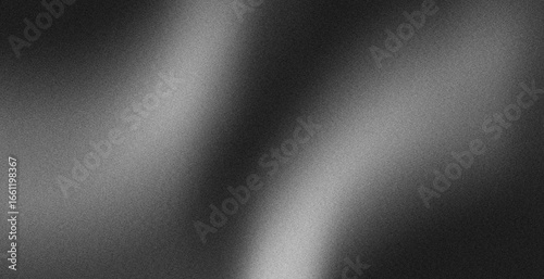 Abstract metal texture with subtle gradations of black and silver.