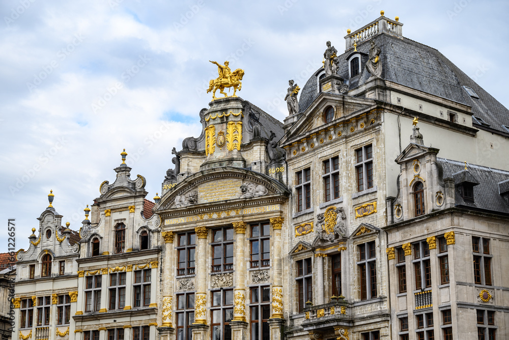 Fototapeta premium Lavishly decorated facades and architectural details of Guildhalls on the Grand-Place Grote Markt square of Brussels, Belgium