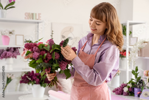 Female florist with beautif...