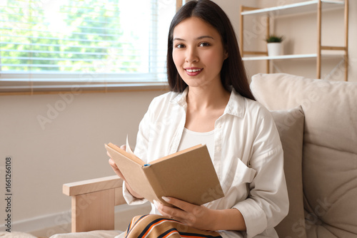 Beautiful young woman readi...