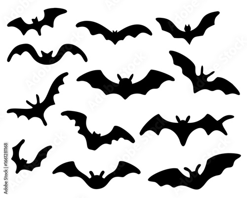 Black silhouettes of bats. isolated on white background. vector icon illustration